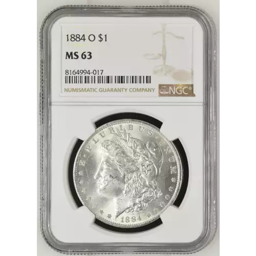 1884 O Morgan Silver Dollar, graded NGC MS-63, showcasing a robust strike with brilliant luster and minimal contact marks typical of a Mint State 63 coin. Struck at the New Orleans Mint in 90% silver and 10% copper, this coin weighs 26.73 grams and featur