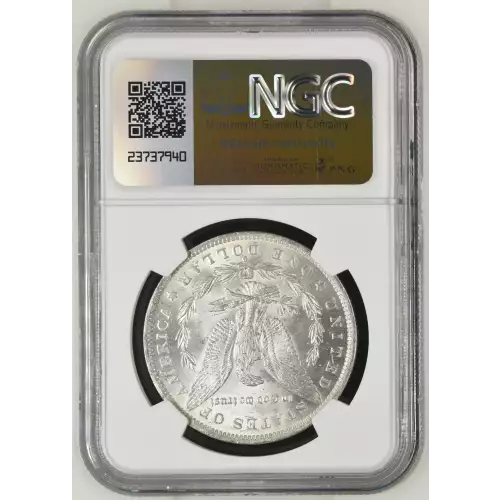 1884 O Morgan Silver Dollar, graded NGC MS-63, showcasing a robust strike with brilliant luster and minimal contact marks typical of a Mint State 63 coin. Struck at the New Orleans Mint in 90% silver and 10% copper, this coin weighs 26.73 grams and featur