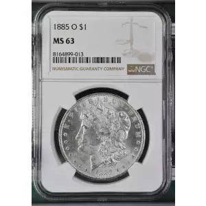 1885 O Morgan Silver Dollar, graded NGC MS-63, showcasing a strong strike with vibrant luster and minimal contact marks typical of a Mint State 63 coin. Struck at the New Orleans Mint in 90% silver and 10% copper, this coin weighs 26.73 grams and features