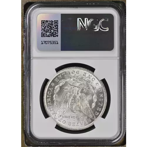 1885 O Morgan Silver Dollar, graded NGC MS-63, showcasing a strong strike with vibrant luster and minimal contact marks typical of a Mint State 63 coin. Struck at the New Orleans Mint in 90% silver and 10% copper, this coin weighs 26.73 grams and features