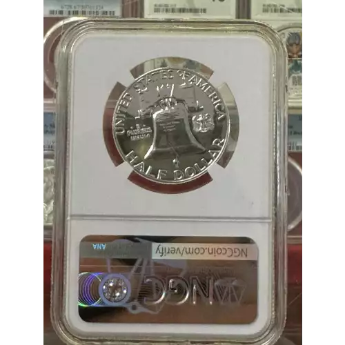 1958 P Franklin Half Dollar, graded NGC PF-67, showcasing a brilliant proof finish with sharp details and attractive luster. Struck in 90% silver, this coin features Benjamin Franklin on the obverse and the Liberty Bell on the reverse, designed by John Si