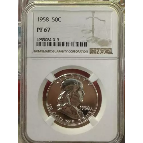 1958 P Franklin Half Dollar, graded NGC PF-67, showcasing a brilliant proof finish with sharp details and attractive luster. Struck in 90% silver, this coin features Benjamin Franklin on the obverse and the Liberty Bell on the reverse, designed by John Si